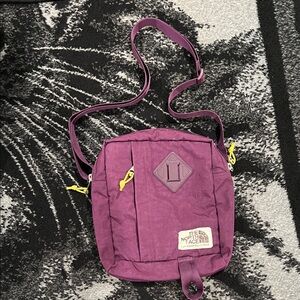 The North Face Violet Crossbody Bag with Yellow Accents